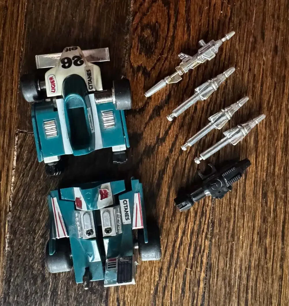 VINTAGE 1984 Transformers G1 Mirage Formula 1 Autobot w/ Weapons PARTS BROKEN